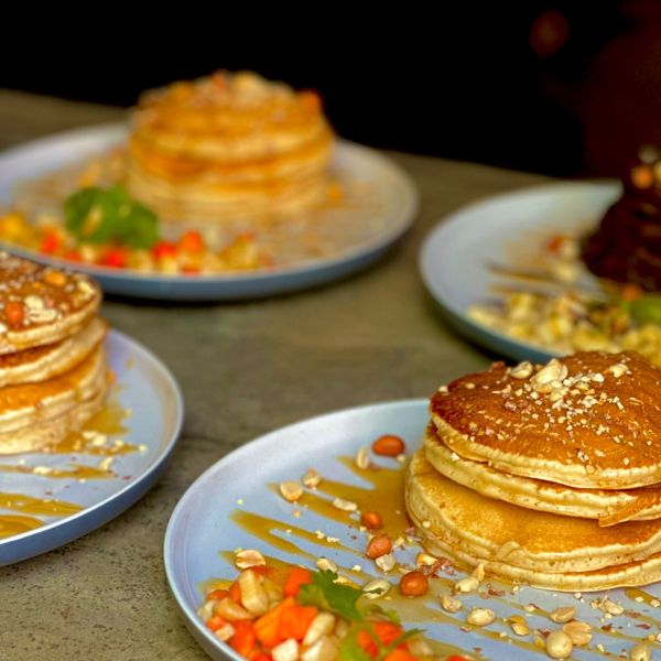 Pancakes with seasonal fruit and nuts at Pranaya Cafe